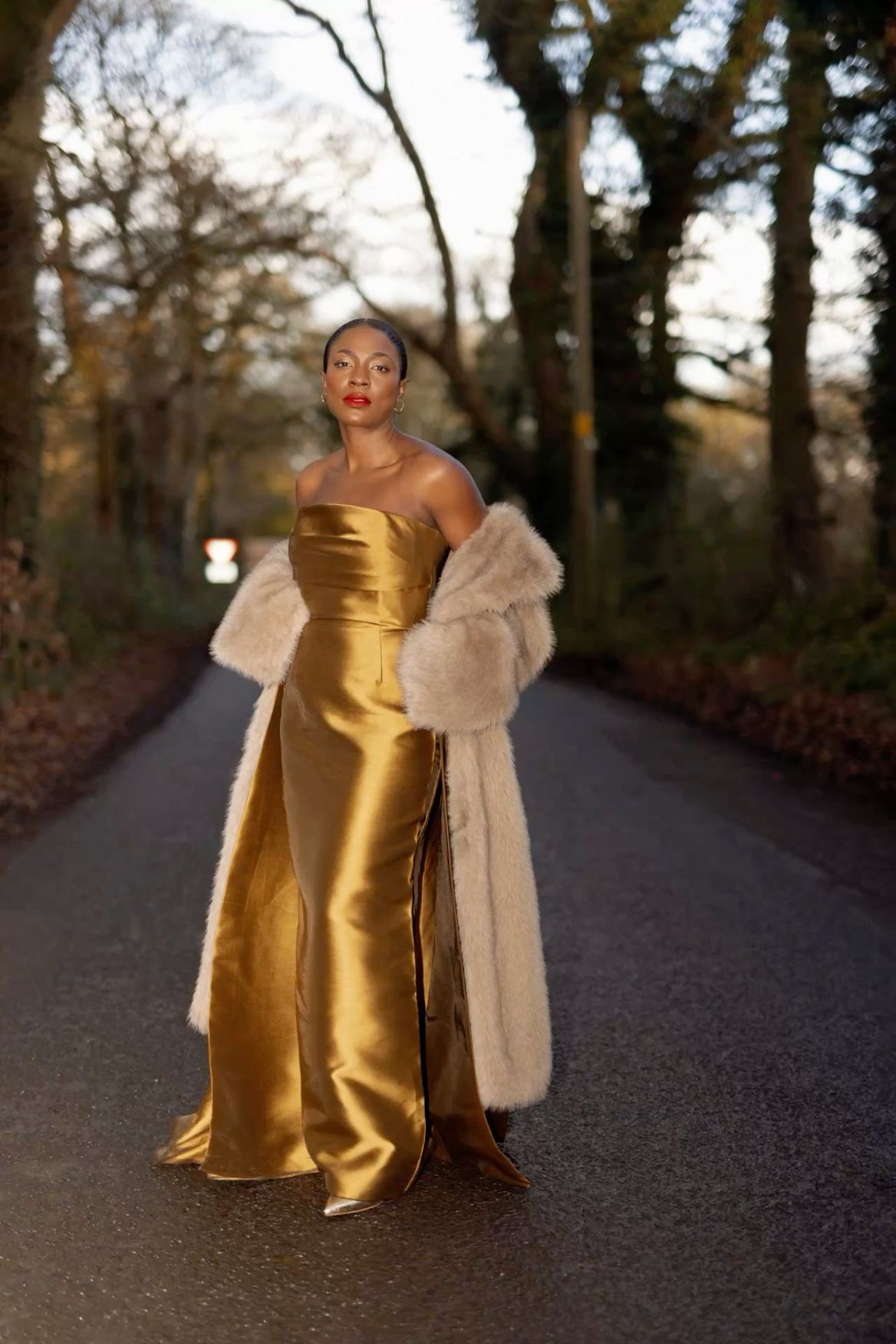 Fur jacket with golden dress