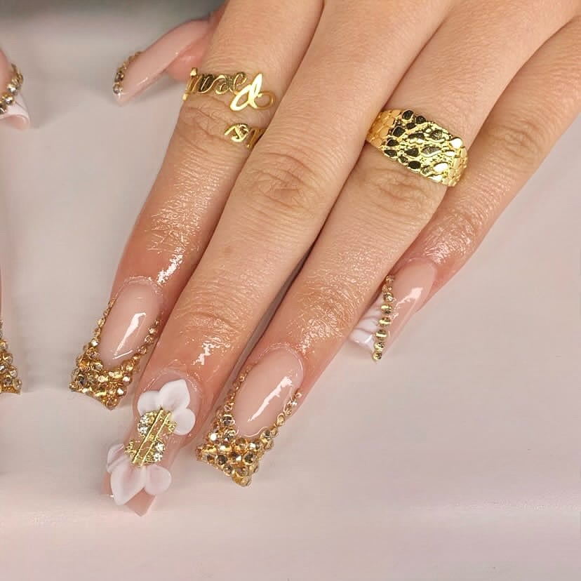 Females Hands With Golden Golden Clog Rings
