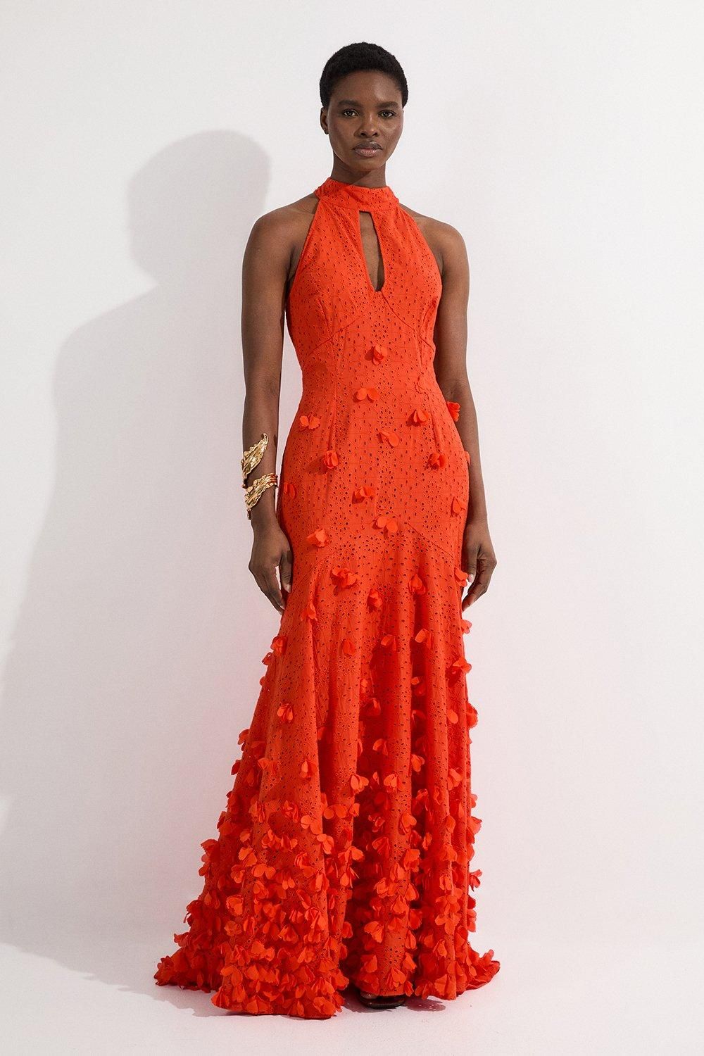 Women with orange cut out maxi dress for spring